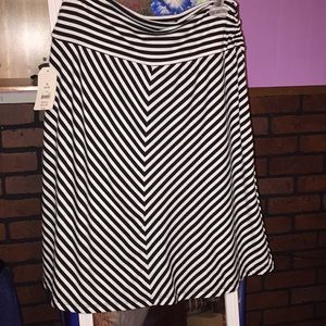 Black and white, knee-length skirt.